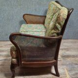 Antique English two-seater canapé, carved wooden frame.