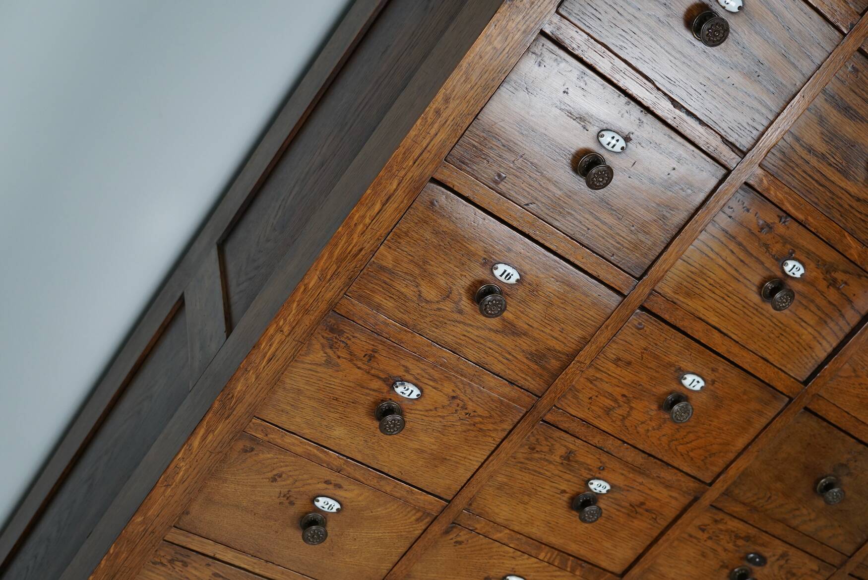 Large dutch oak apothecary cabinet / barber cabinet with enamel shields, 1900s