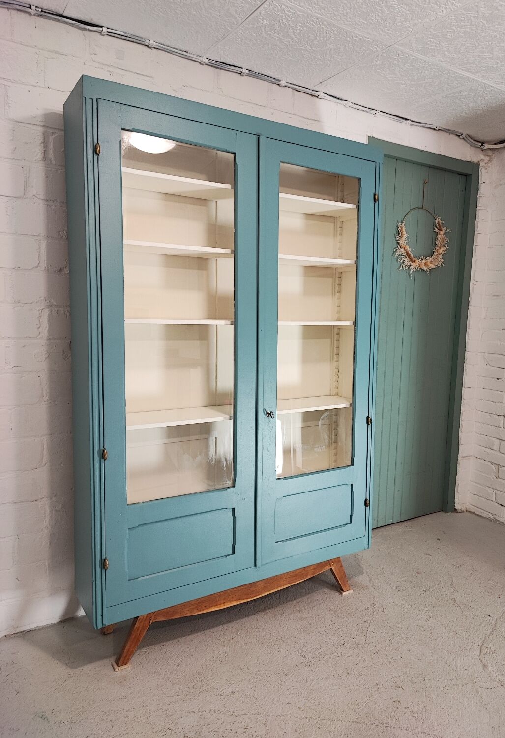 Blue vintage bookcase