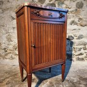 French antique bedside table in walnut with a marble top and porcelain interior, early 20th century.