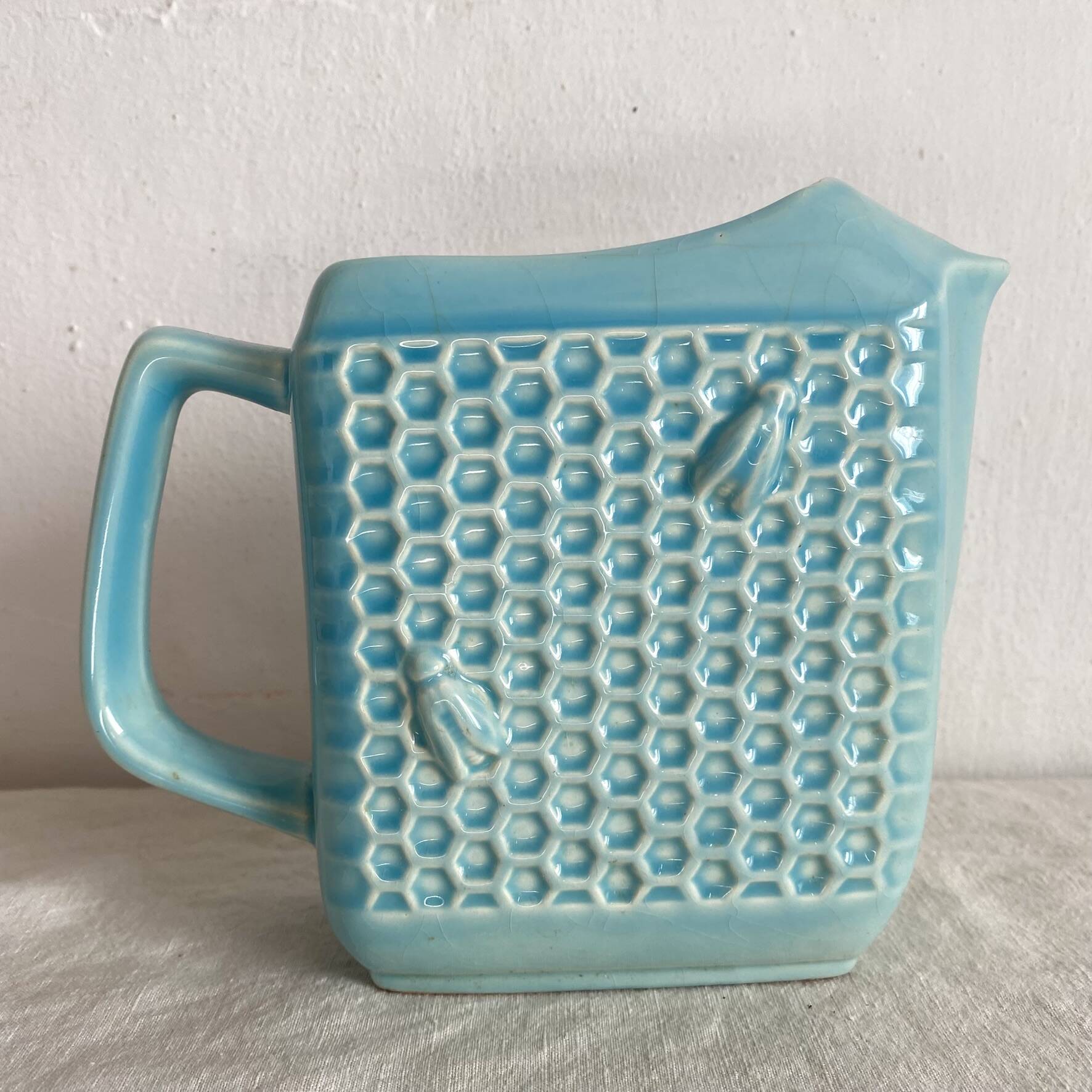 St Clément earthenware jug with bee decoration.