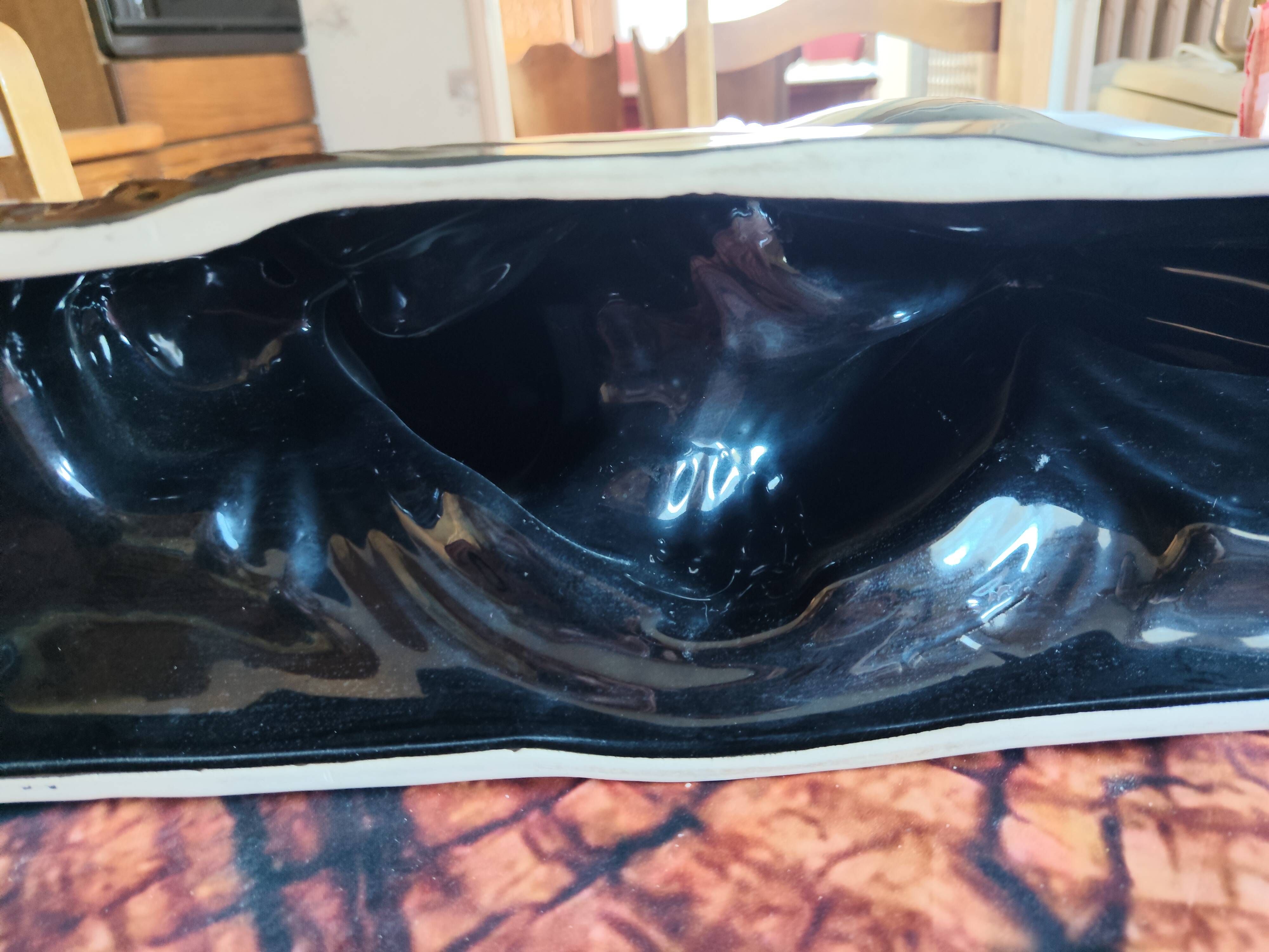 Sculpture of a nude woman lying down Art Deco — C. Delaney / St Clément (Black enamel)