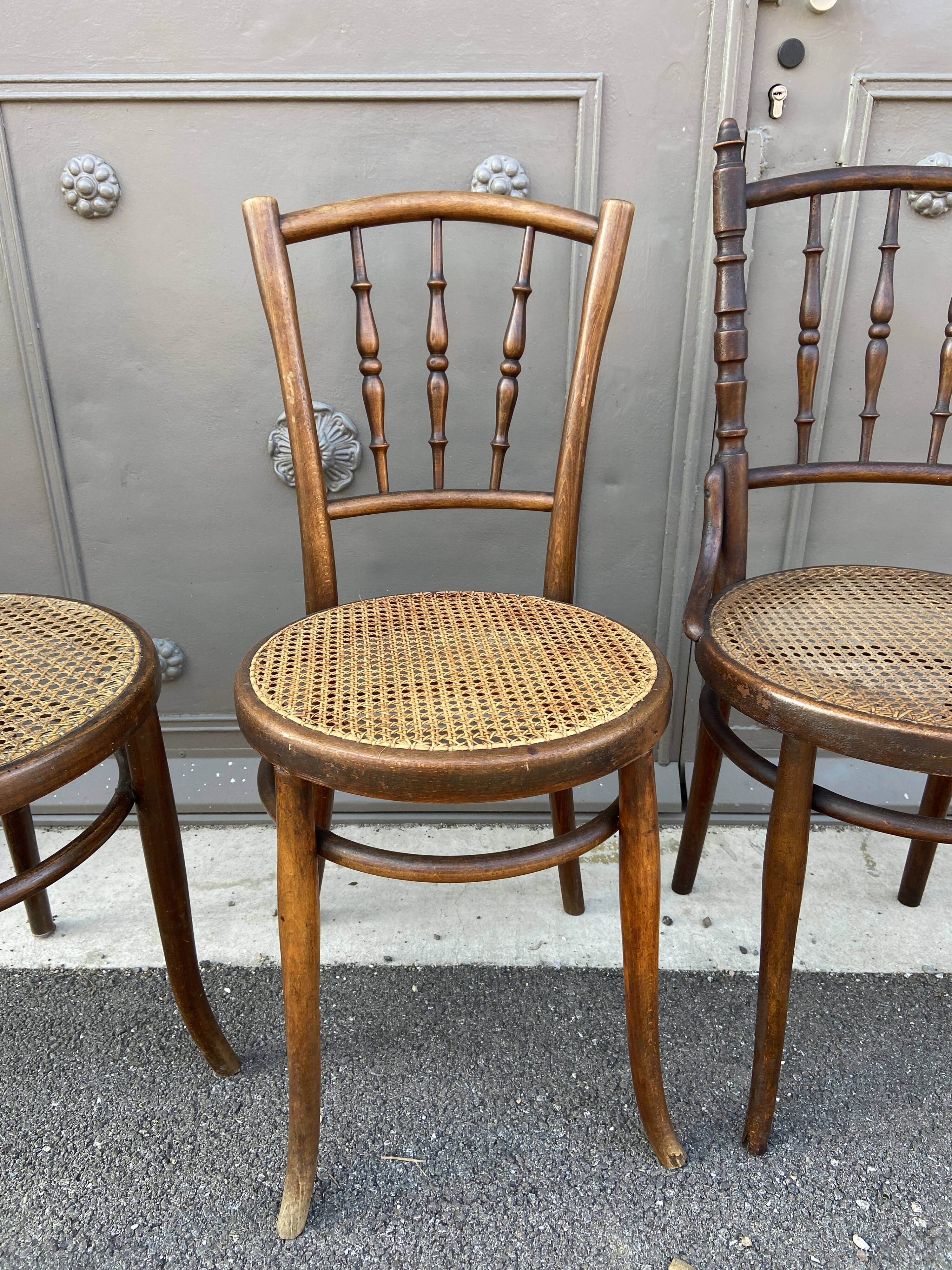 Set of 4 Mismatched pramed wood coffee bistro chairs