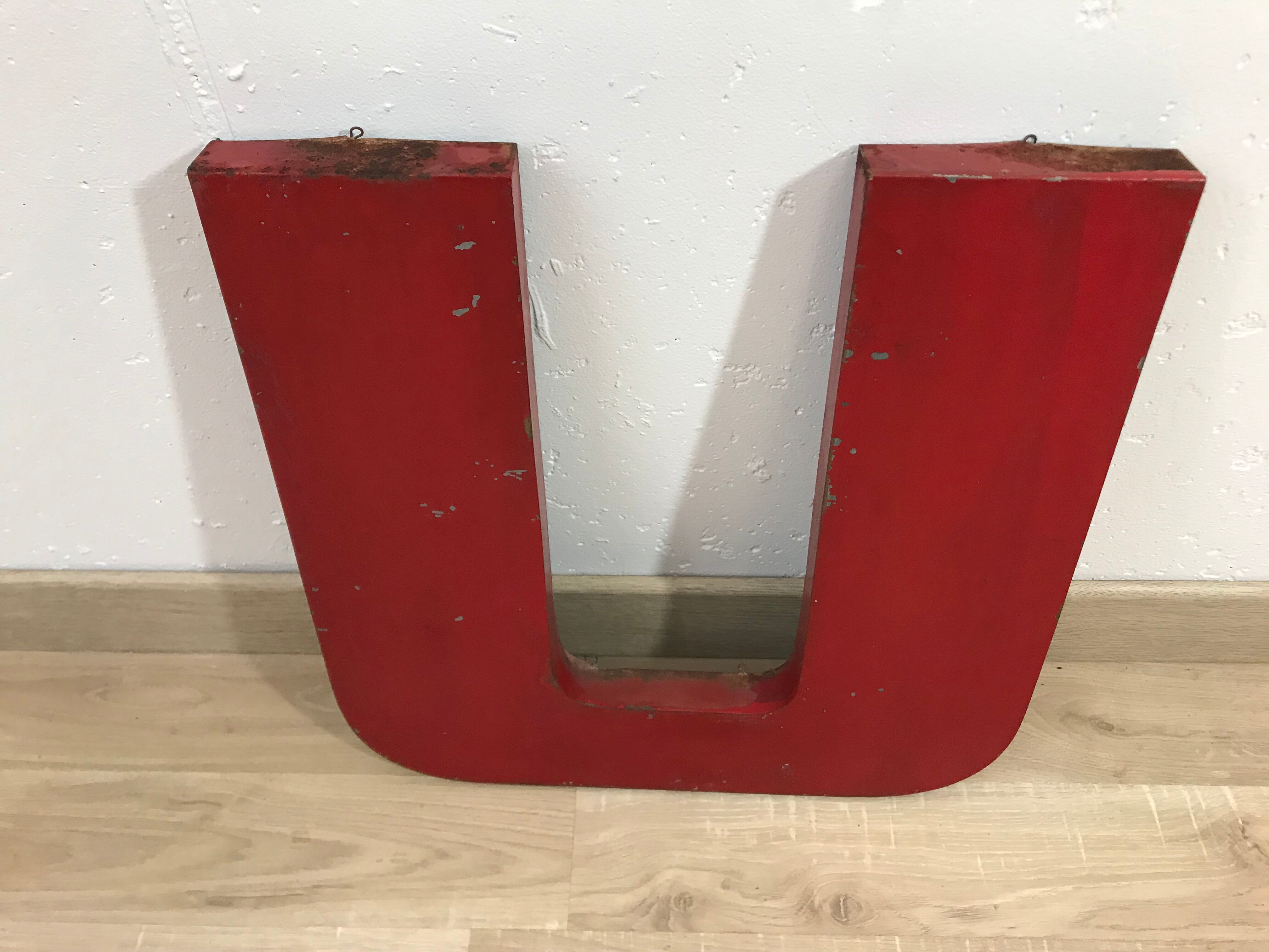 Old metal letter "U"