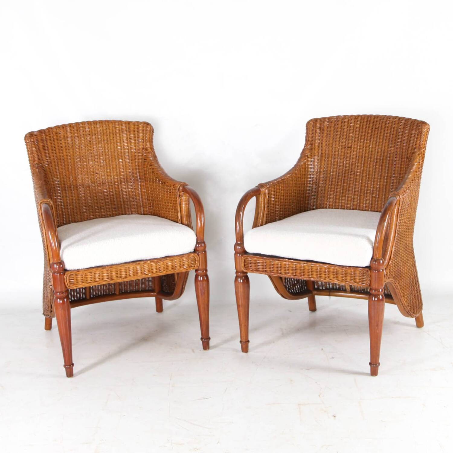 Pair of wooden and wicker armchairs