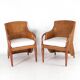 Pair of wooden and wicker armchairs