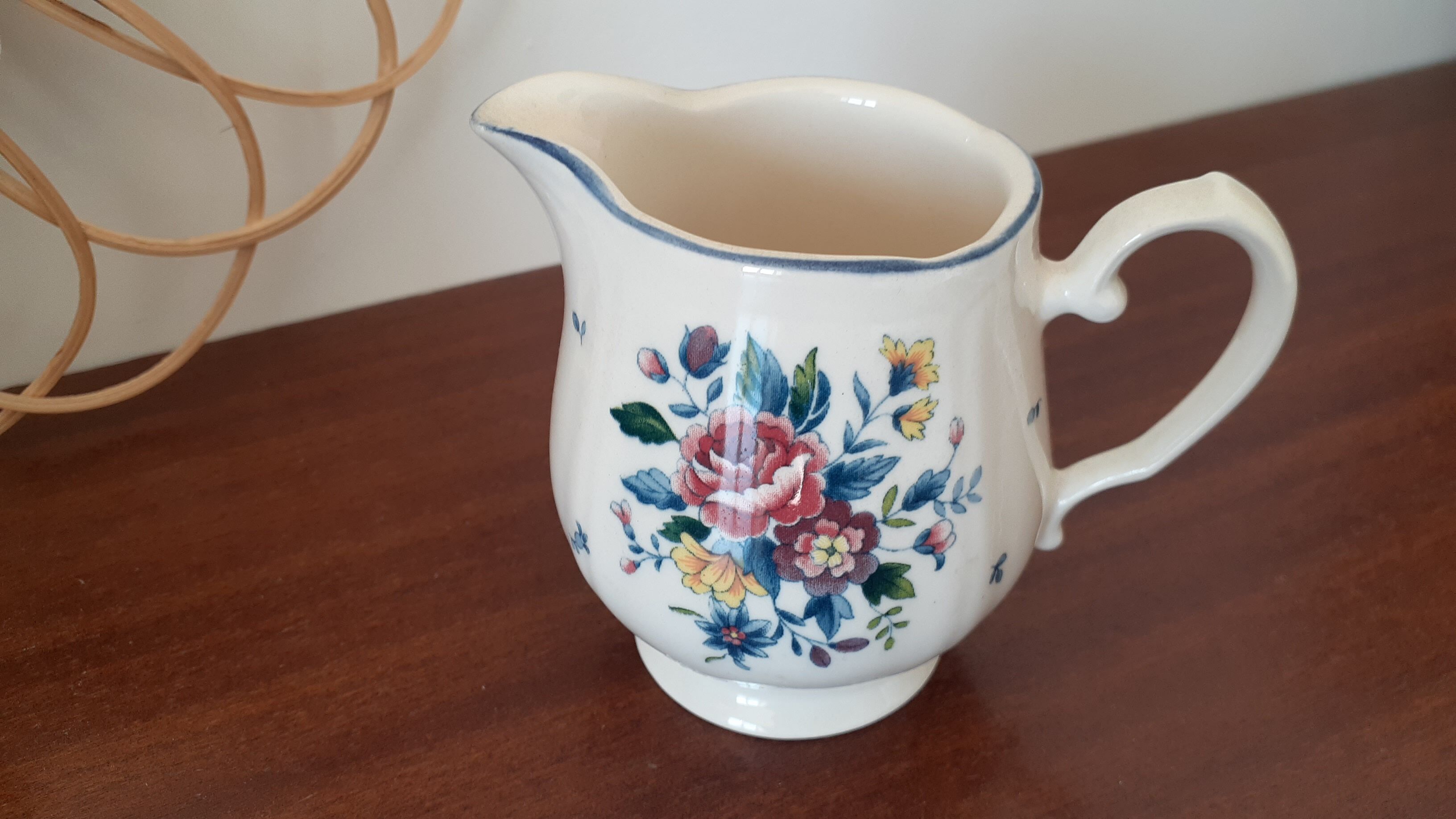 Flowery milk jug