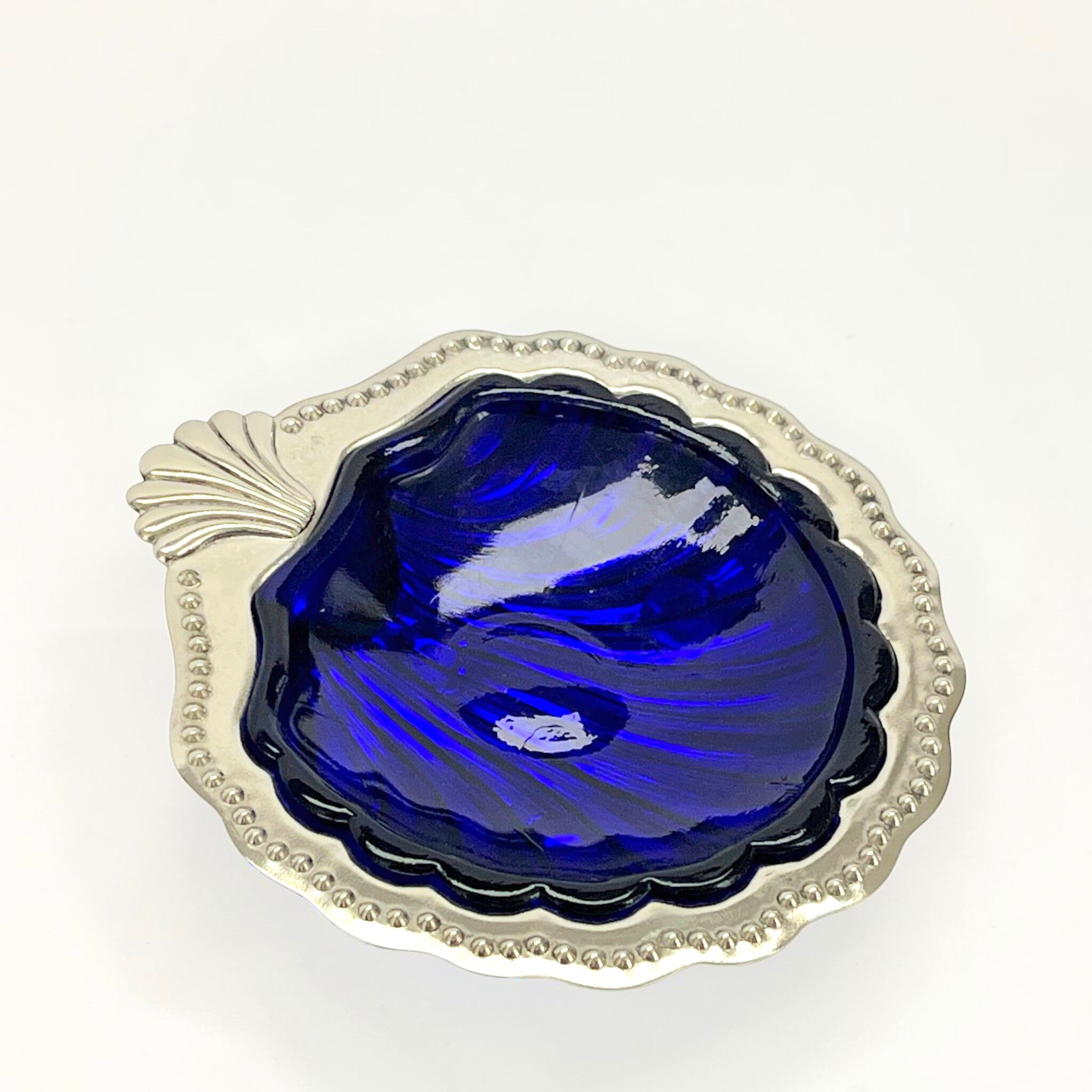 Silver-plated shell butter dish and vintage blue bowl from the 70s.