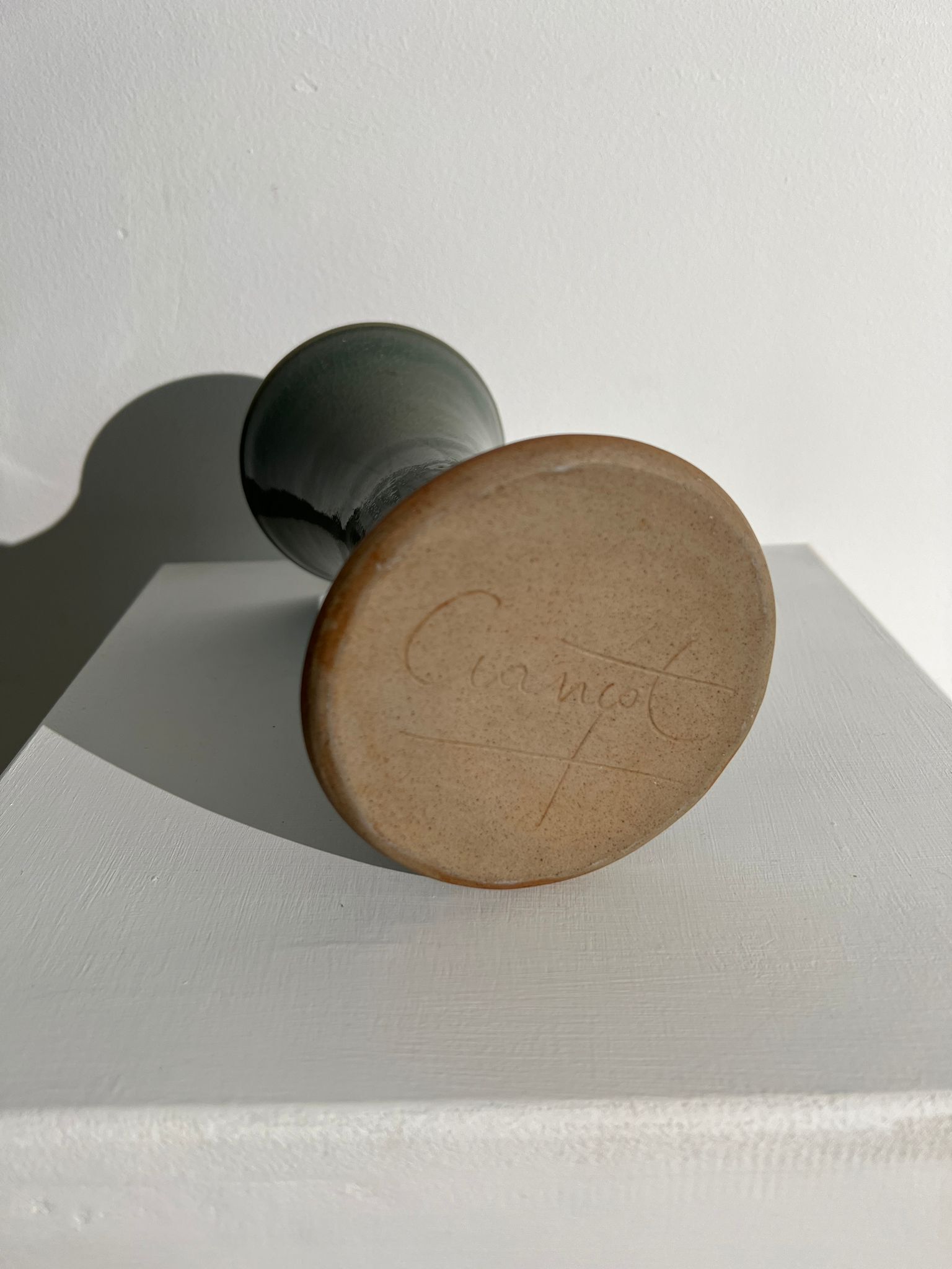 Dark green handcrafted vase with glazed ceramic grass blades