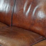 Sturdy and large vintage sheepskin design 4-seater sofa with a sleek look