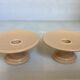 Pair of beige candlesticks