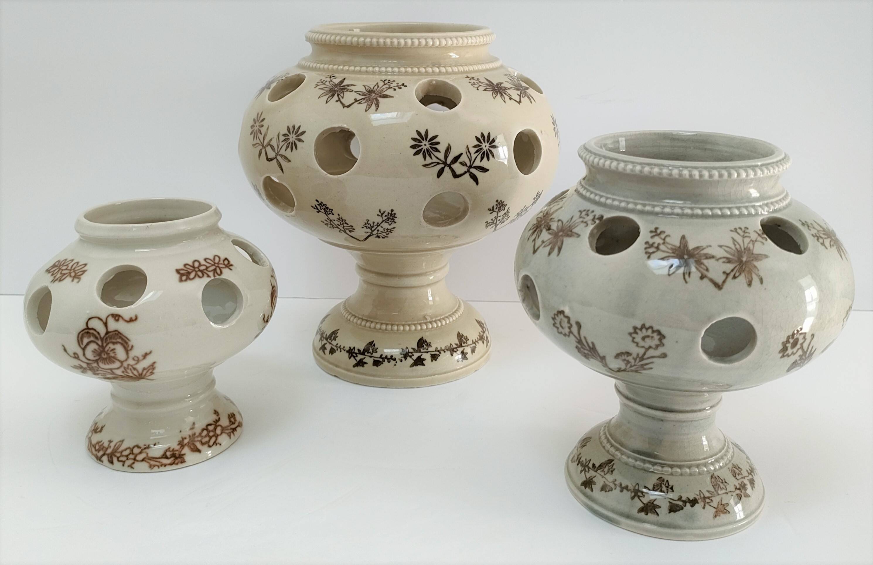 Three Saint-Uze ceramic tealight candle holders, early 20th century
