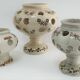 Three Saint-Uze ceramic tealight candle holders, early 20th century
