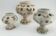 Three Saint-Uze ceramic tealight candle holders, early 20th century