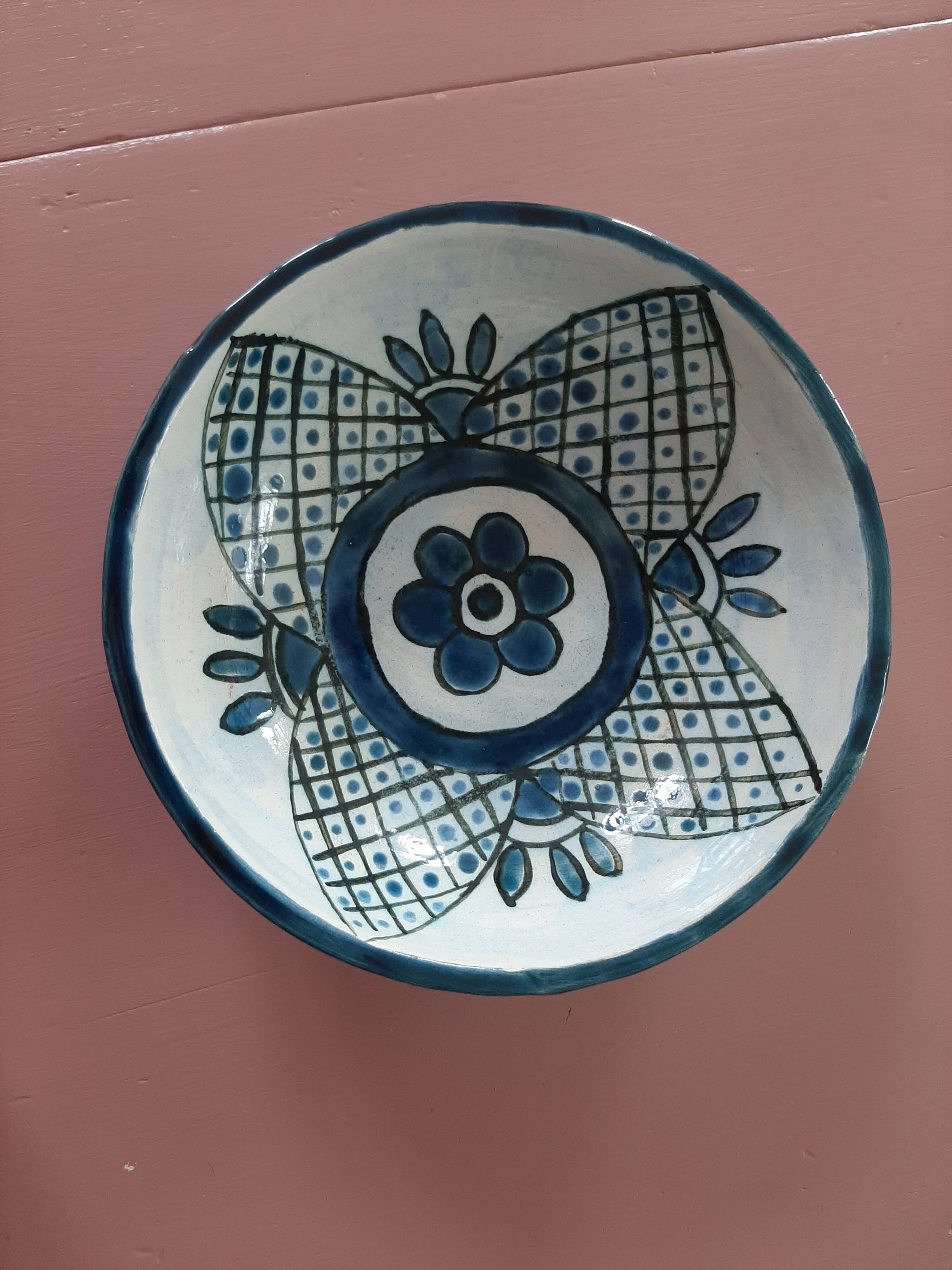 barbotine style salad bowl with blue floral pattern