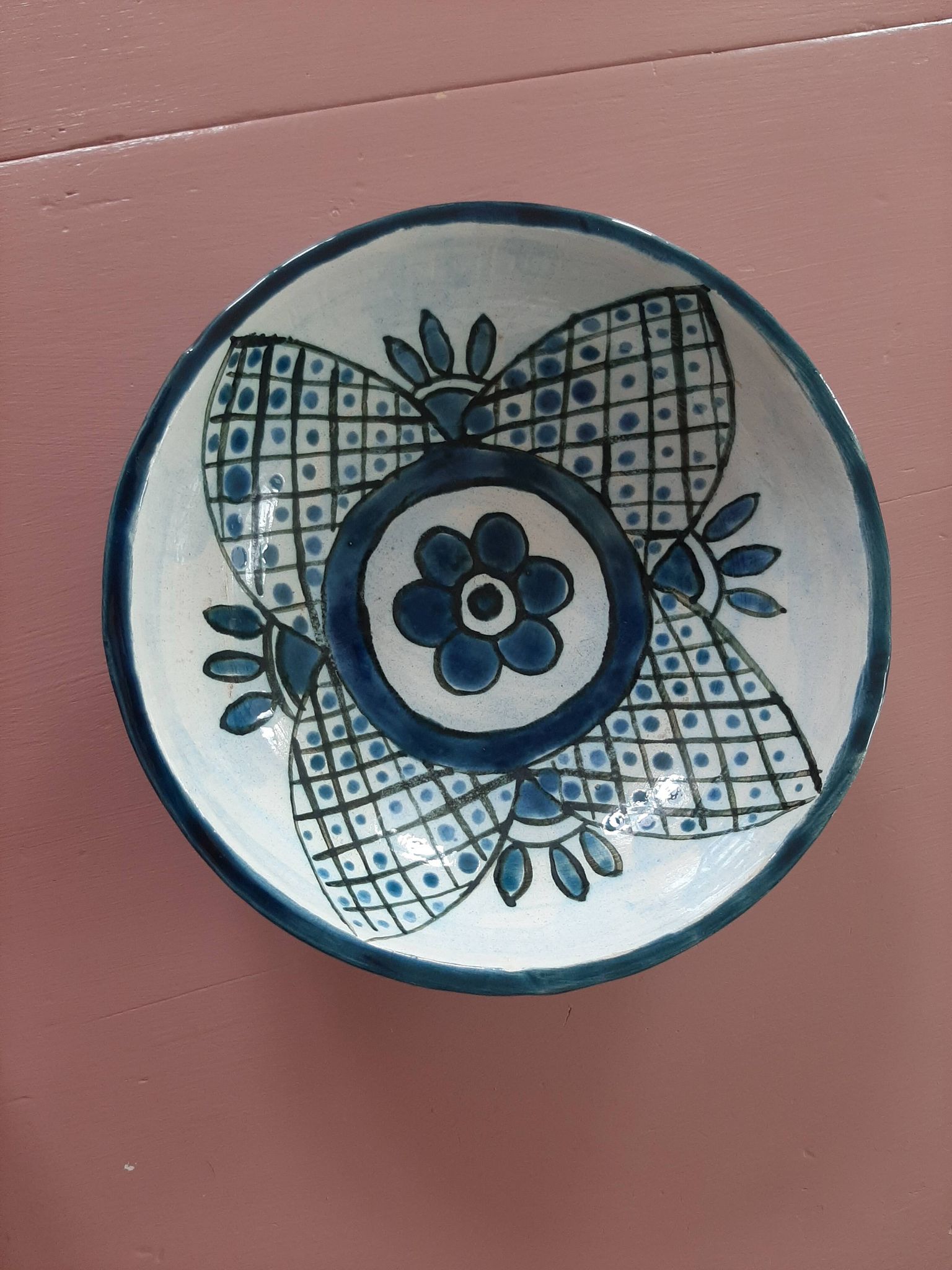 barbotine style salad bowl with blue floral pattern