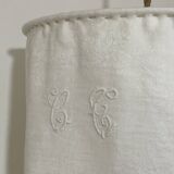 Old linen drapery with monogram and bird by Georges Braque