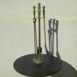 Gilded brass fireplace servant.