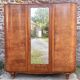 Art Deco wardrobe in flame walnut with central mirror – French elegance