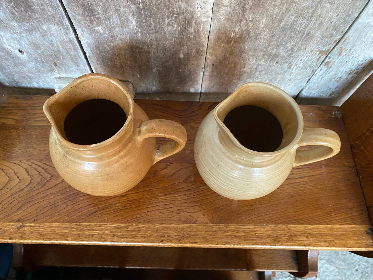 Pair antique cnp village beige & cream stoneware pitchers vintage