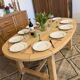 Extendable farmhouse table in solid oak