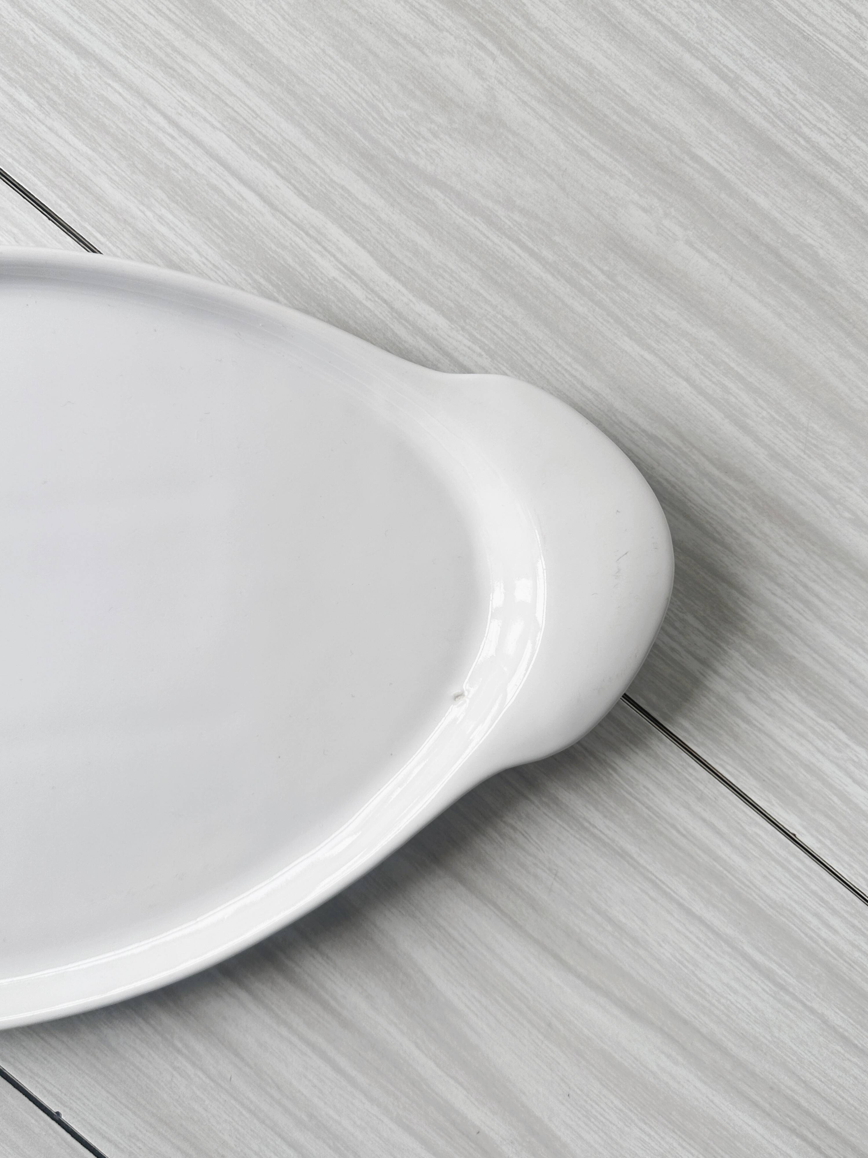 Porcelain goose serving dish.