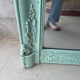 Large antique mercury mirror, patinated blue sculpted frame.