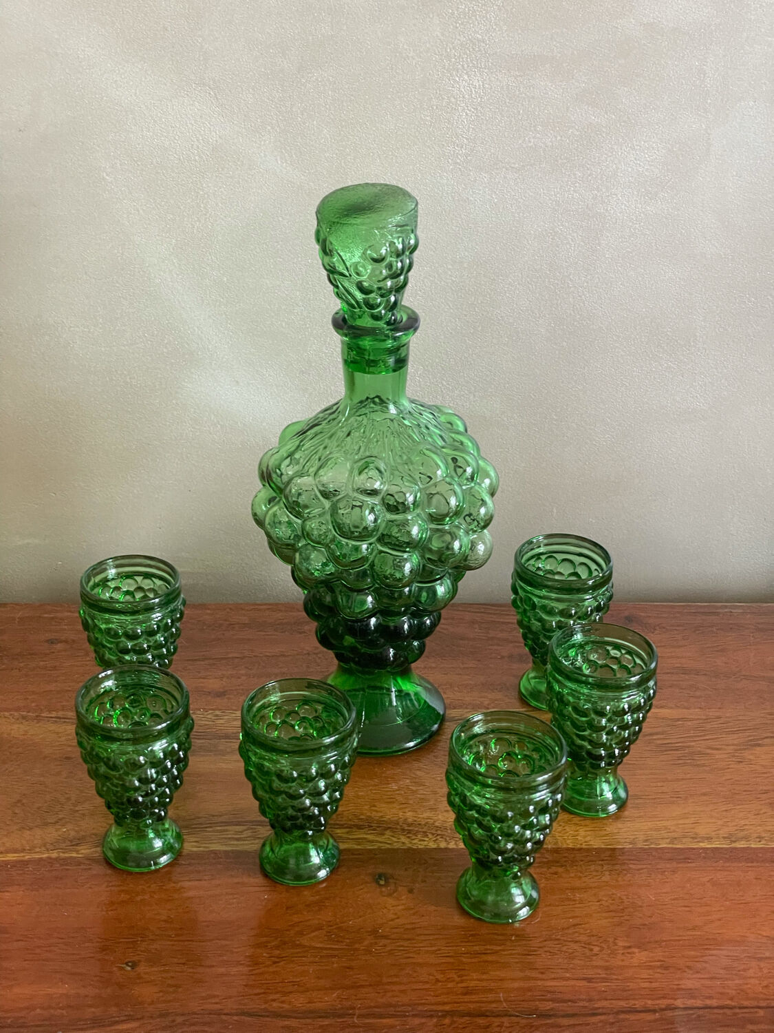 Liquor decanter and grape bunch shaped glasses