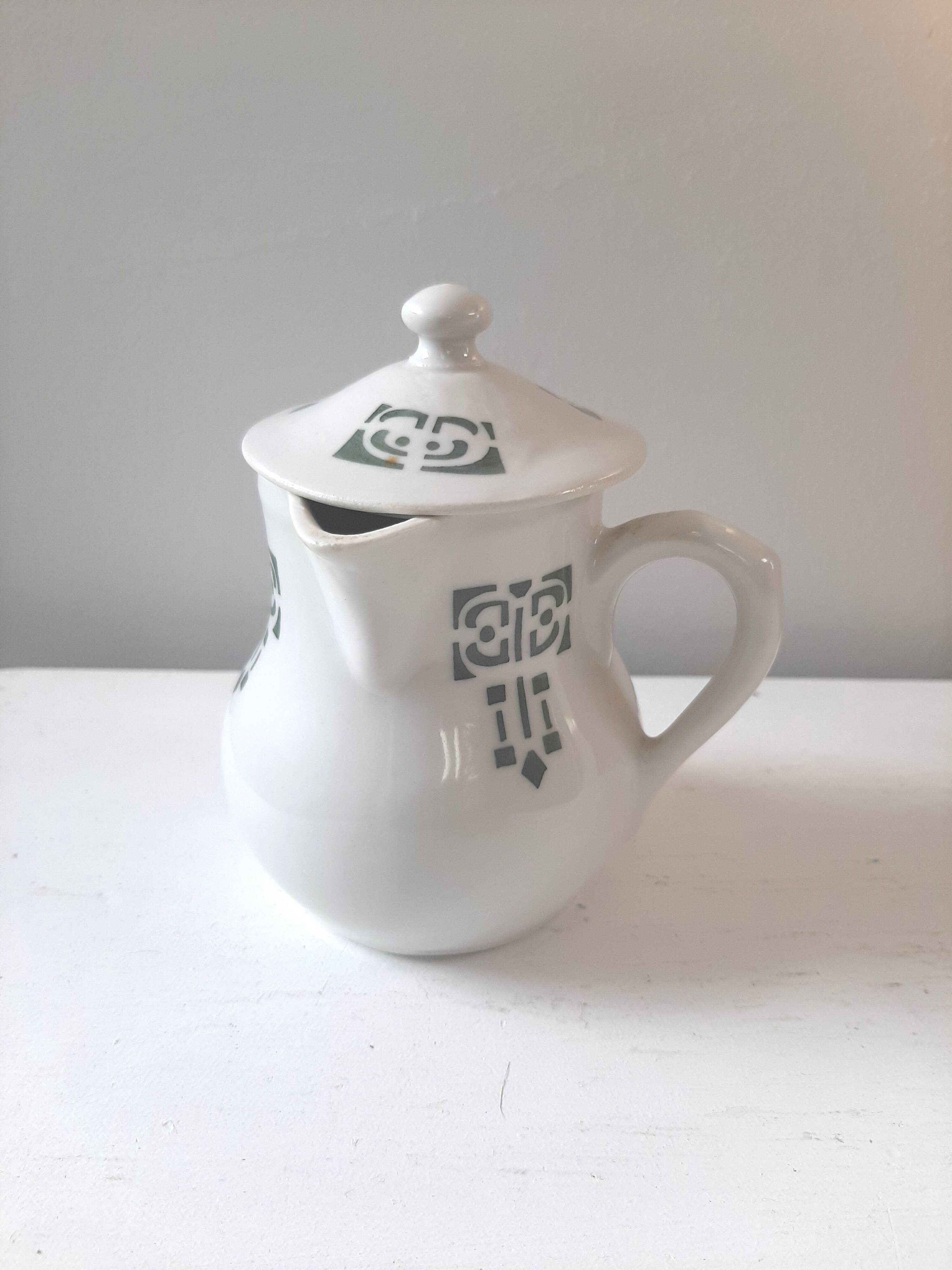 Vintage cream pot with Art Deco pattern and its lid.