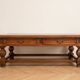 Antique solid wood coffee table with drawers.
