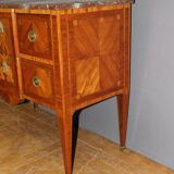 Louis XVI style chest of drawers with music attributes