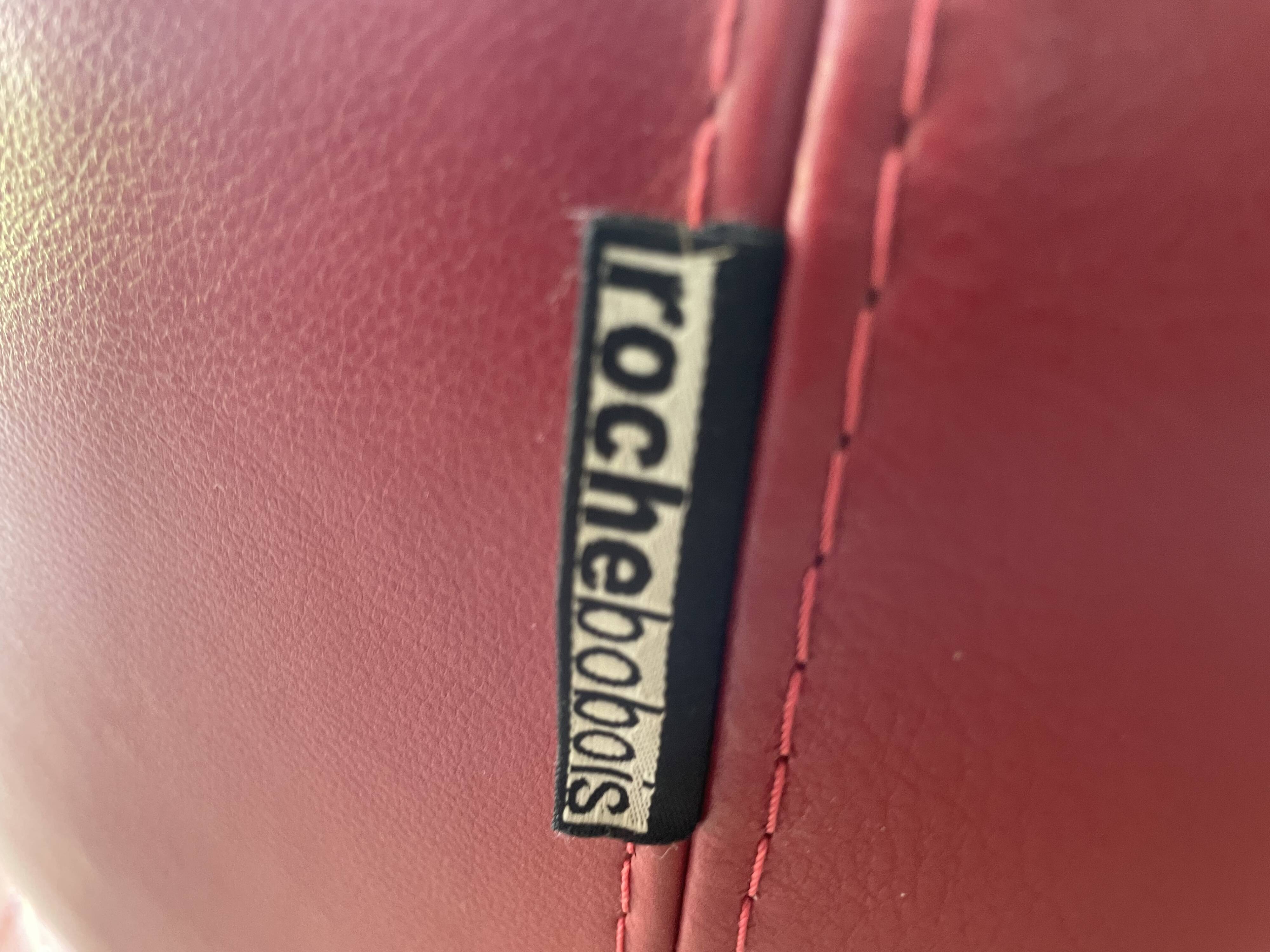 Curl armchair in red leather by Roche Bobois