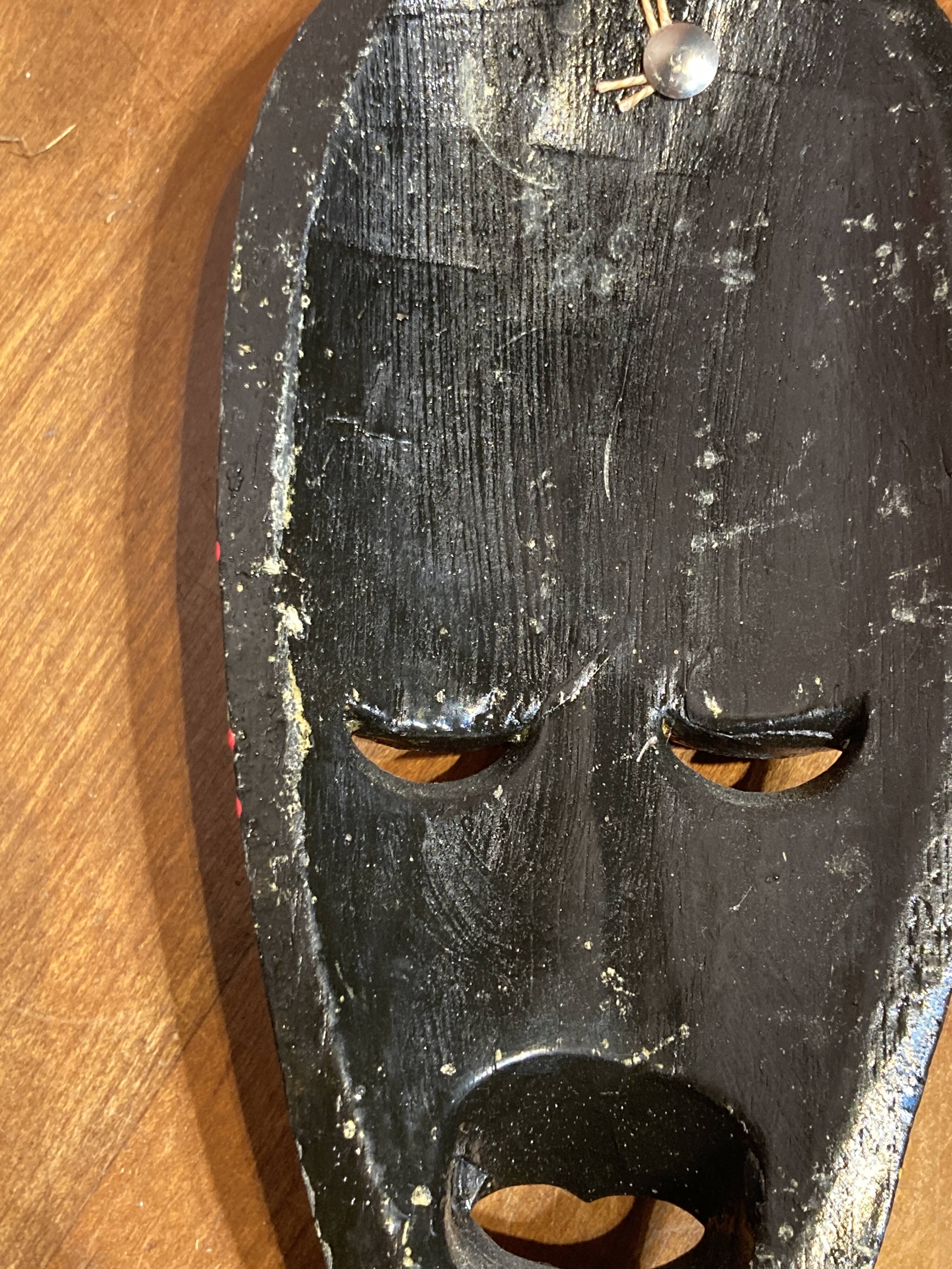 Wooden wall mask
