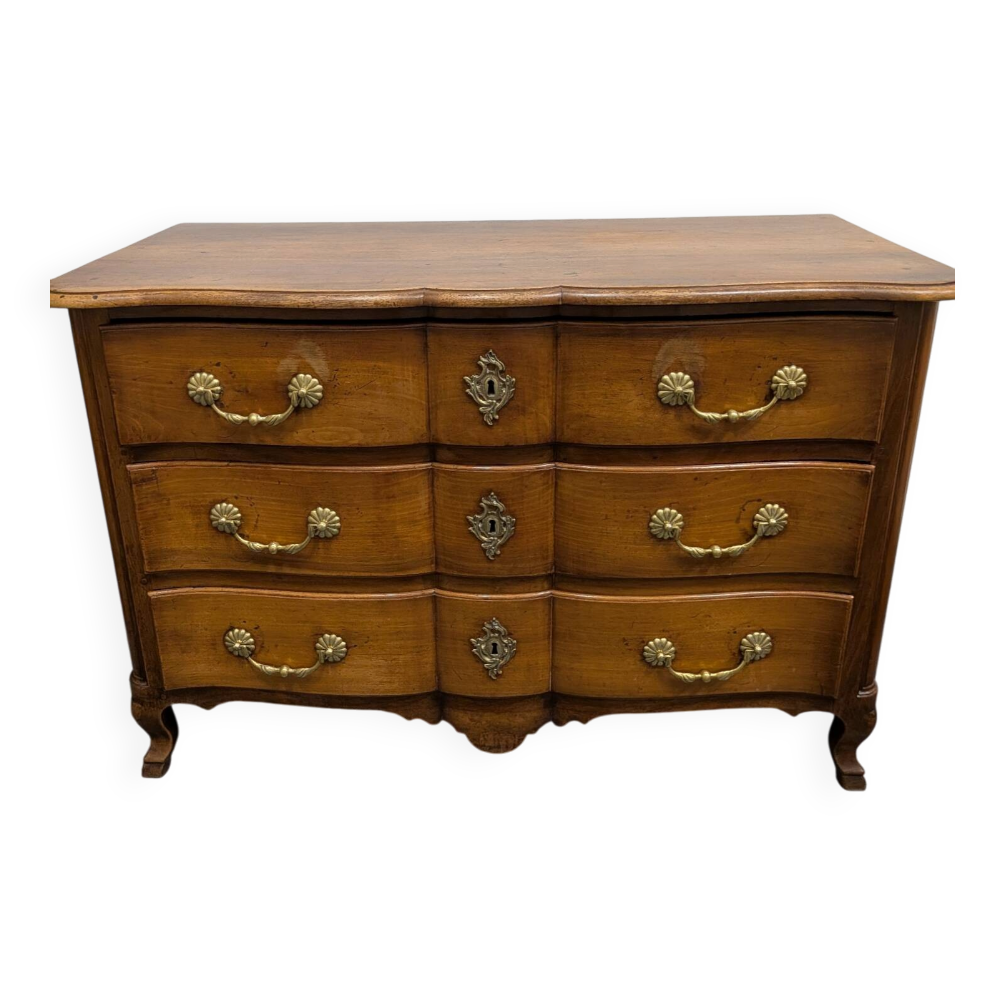 Louis XV crossbow commode in walnut, three drawers, 18th century.
