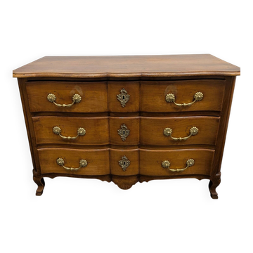 Louis XV crossbow commode in walnut, three drawers, 18th century.