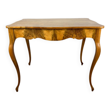 Louis XV table, light walnut, early 19th century.