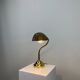 French table lamp in brass with a shell-shaped shade from the 1950s.