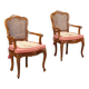 Antique baroque-style armchairs in walnut and fabric, 19th century.