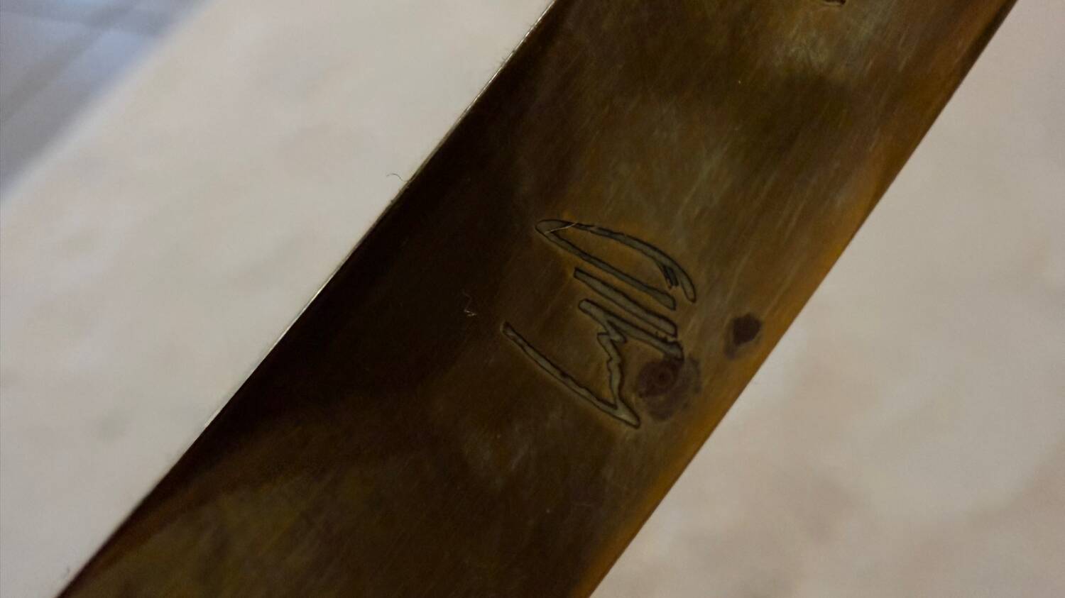 Gilt brass console table with glass top by Jacques Quinet