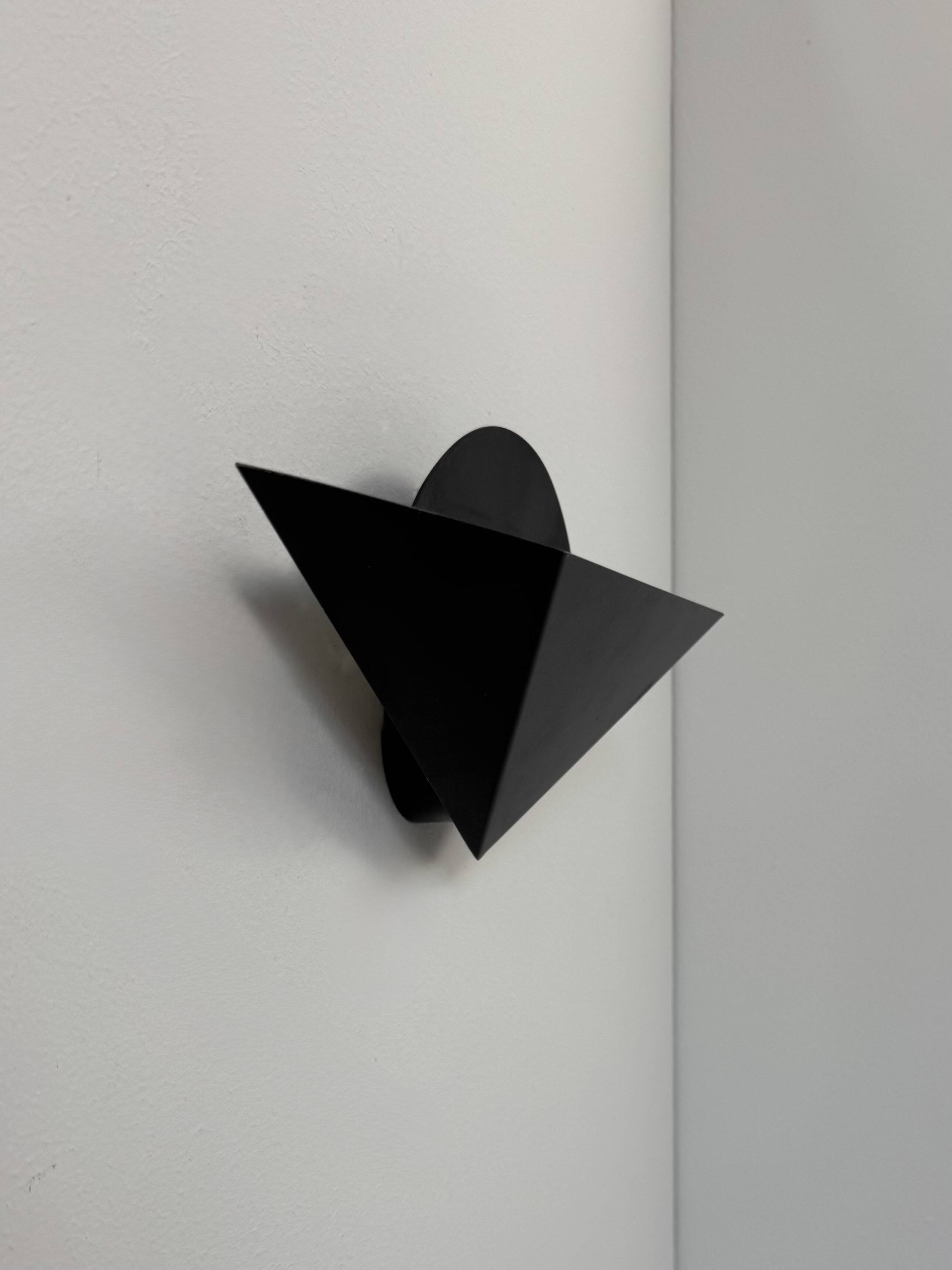 Pair of vintage wall sconces, matte black metal, France, 1970.