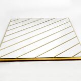 Large, exceptional 1970s brass wall mirror with diagonal mirror strips