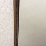 Framed mirror in bronze