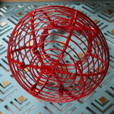 Egg basket in wire painted red, vintage from the 1970s