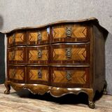 Louis XV period Arbalète chest of drawers in noble wood marquetry