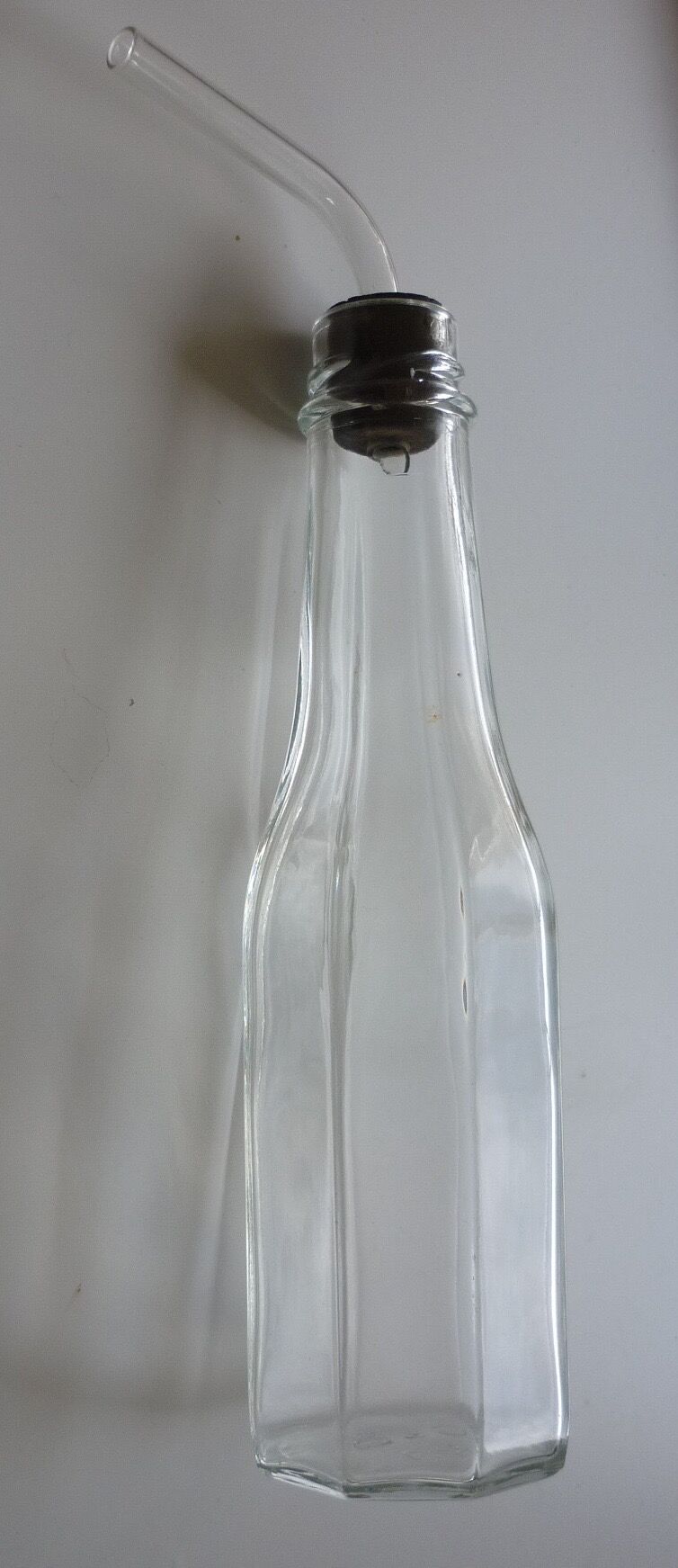 Old bottle with glass pipette