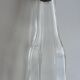 Old bottle with glass pipette