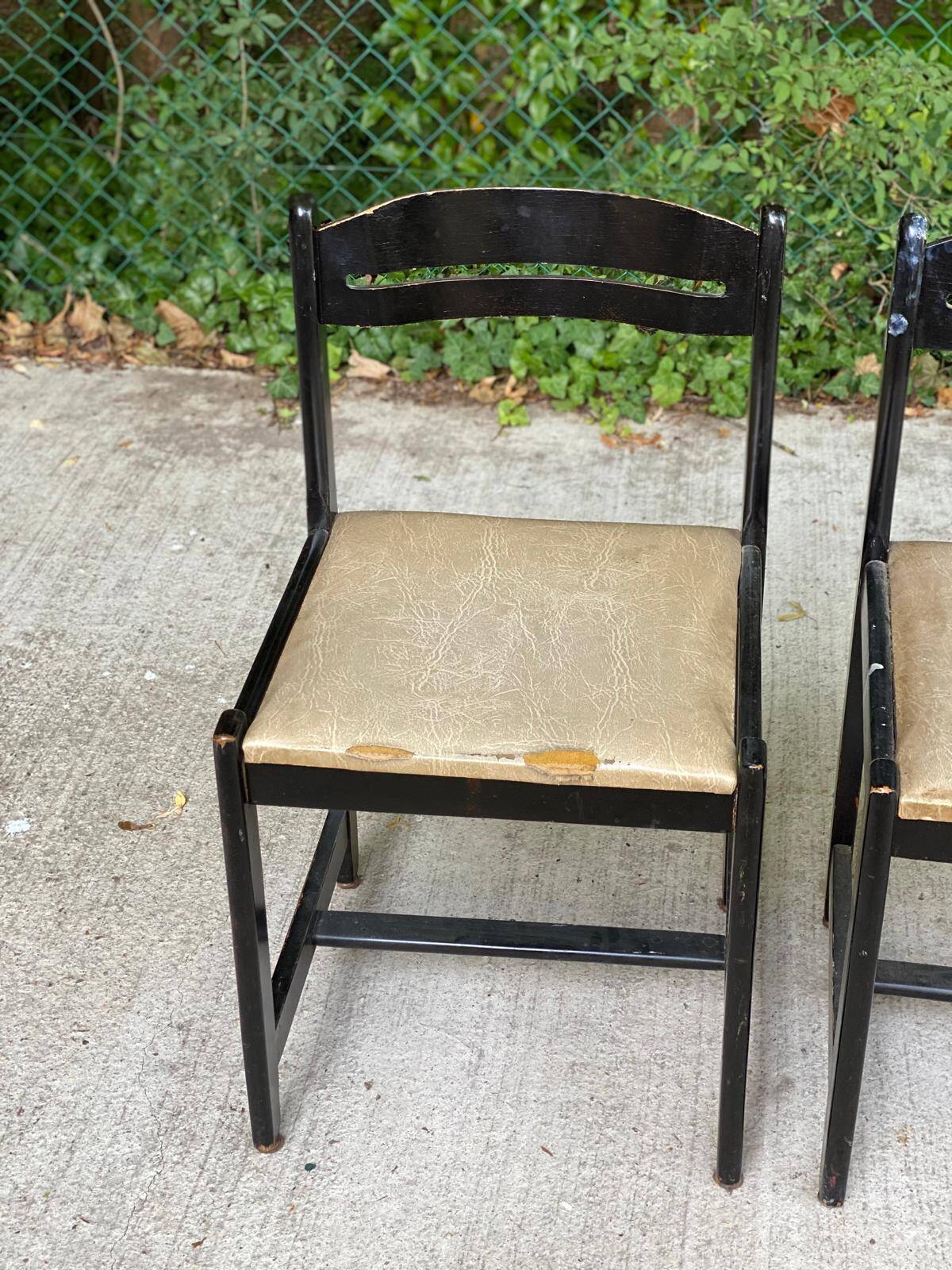 4 black solid wood and beige leather chairs from the 80s