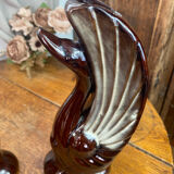 Pair of ceramic vases in the shape of swans.