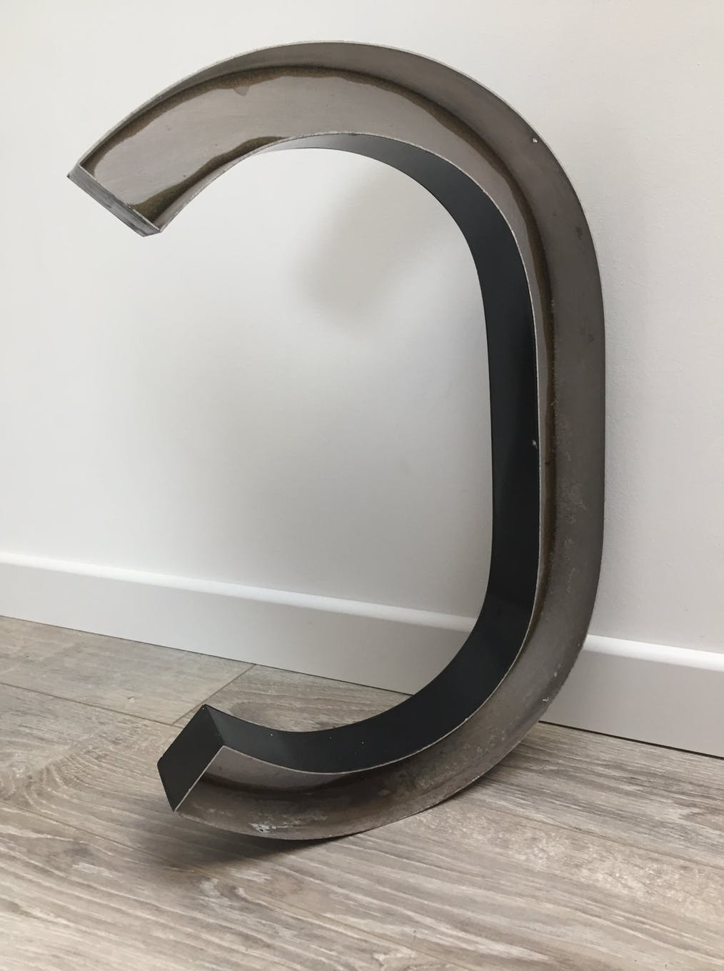 Letter C metal sign