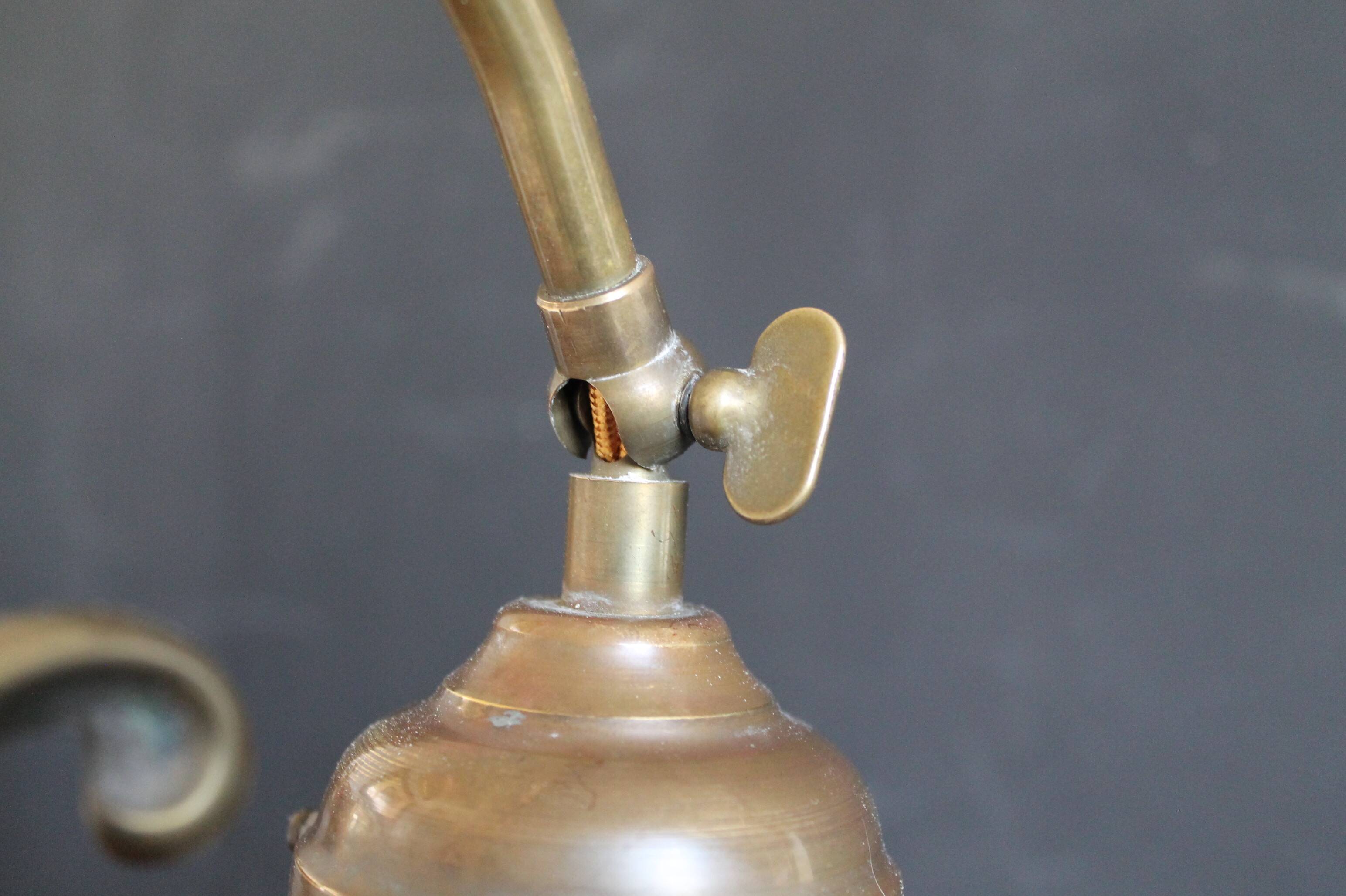 Art Nouveau style brass "rise and fall" table lamps after WAS Benson
